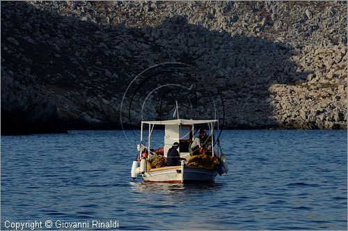 GRECIA - GREECE - Isole del Dodecaneso - Dodecanese Islands - Isola di Simi - Symi - pescatore lungo la costa nord