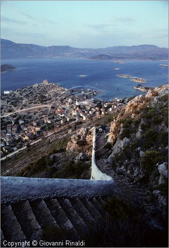 GREECE - (Dodecanese Island) - GRECIA (Dodecanneso) - ISOLA DI KASTELLORIZO (Megisti) - veduta del paese e del porto dalla montagna, sullo sfondo la costa turca