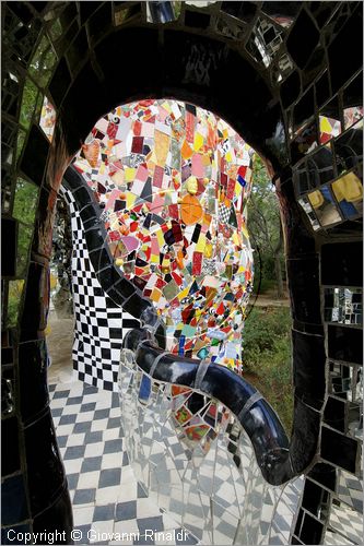 ITALY - Capalbio (GR) - localit Garavicchio - Il Giardino dei Tarocchi - opera originale e fantastica ideata dall'artista francese Niki de Saint Phalle. L'opera rappresenta i 22 Arcani Maggiori dei Tarocchi realizzati con fantastiche sculture di cemento armato e poliestere, ricoperte con mosaico di ceramica , vetri e specchi