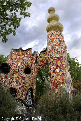 ITALY - Capalbio (GR) - localit Garavicchio - Il Giardino dei Tarocchi - opera originale e fantastica ideata dall'artista francese Niki de Saint Phalle. L'opera rappresenta i 22 Arcani Maggiori dei Tarocchi realizzati con fantastiche sculture di cemento armato e poliestere, ricoperte con mosaico di ceramica , vetri e specchi