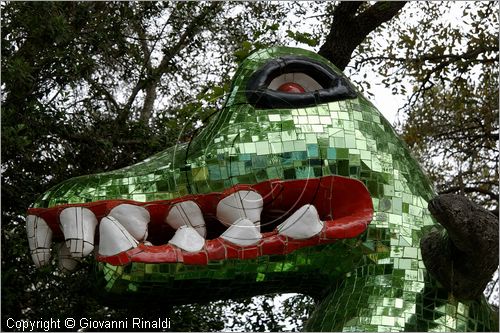 ITALY - Capalbio (GR) - localit Garavicchio - Il Giardino dei Tarocchi - opera originale e fantastica ideata dall'artista francese Niki de Saint Phalle. L'opera rappresenta i 22 Arcani Maggiori dei Tarocchi realizzati con fantastiche sculture di cemento armato e poliestere, ricoperte con mosaico di ceramica , vetri e specchi