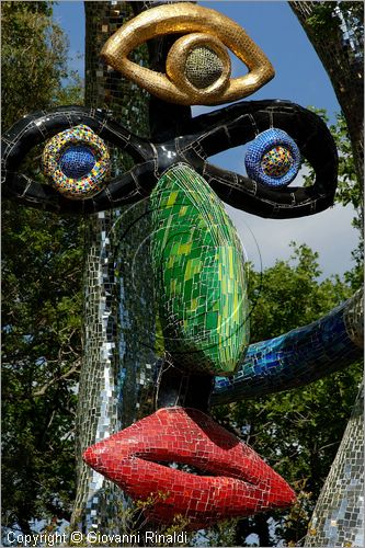 ITALY - Capalbio (GR) - localit Garavicchio - Il Giardino dei Tarocchi - opera originale e fantastica ideata dall'artista francese Niki de Saint Phalle. L'opera rappresenta i 22 Arcani Maggiori dei Tarocchi realizzati con fantastiche sculture di cemento armato e poliestere, ricoperte con mosaico di ceramica , vetri e specchi