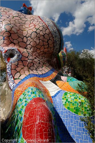 ITALY - Capalbio (GR) - localit Garavicchio - Il Giardino dei Tarocchi - opera originale e fantastica ideata dall'artista francese Niki de Saint Phalle. L'opera rappresenta i 22 Arcani Maggiori dei Tarocchi realizzati con fantastiche sculture di cemento armato e poliestere, ricoperte con mosaico di ceramica , vetri e specchi