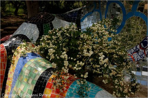 ITALY - Capalbio (GR) - localit Garavicchio - Il Giardino dei Tarocchi - opera originale e fantastica ideata dall'artista francese Niki de Saint Phalle. L'opera rappresenta i 22 Arcani Maggiori dei Tarocchi realizzati con fantastiche sculture di cemento armato e poliestere, ricoperte con mosaico di ceramica , vetri e specchi