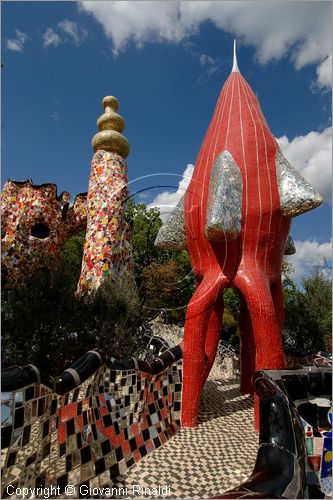 ITALY - Capalbio (GR) - localit Garavicchio - Il Giardino dei Tarocchi - opera originale e fantastica ideata dall'artista francese Niki de Saint Phalle. L'opera rappresenta i 22 Arcani Maggiori dei Tarocchi realizzati con fantastiche sculture di cemento armato e poliestere, ricoperte con mosaico di ceramica , vetri e specchi