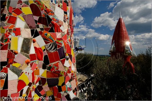 ITALY - Capalbio (GR) - localit Garavicchio - Il Giardino dei Tarocchi - opera originale e fantastica ideata dall'artista francese Niki de Saint Phalle. L'opera rappresenta i 22 Arcani Maggiori dei Tarocchi realizzati con fantastiche sculture di cemento armato e poliestere, ricoperte con mosaico di ceramica , vetri e specchi