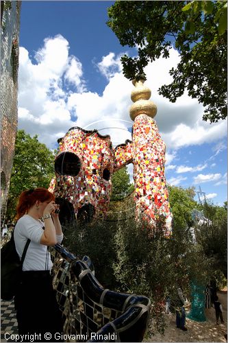 ITALY - Capalbio (GR) - localit Garavicchio - Il Giardino dei Tarocchi - opera originale e fantastica ideata dall'artista francese Niki de Saint Phalle. L'opera rappresenta i 22 Arcani Maggiori dei Tarocchi realizzati con fantastiche sculture di cemento armato e poliestere, ricoperte con mosaico di ceramica , vetri e specchi