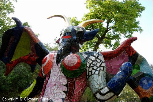 ITALY - Capalbio (GR) - localit Garavicchio - Il Giardino dei Tarocchi - opera originale e fantastica ideata dall'artista francese Niki de Saint Phalle. L'opera rappresenta i 22 Arcani Maggiori dei Tarocchi realizzati con fantastiche sculture di cemento armato e poliestere, ricoperte con mosaico di ceramica , vetri e specchi