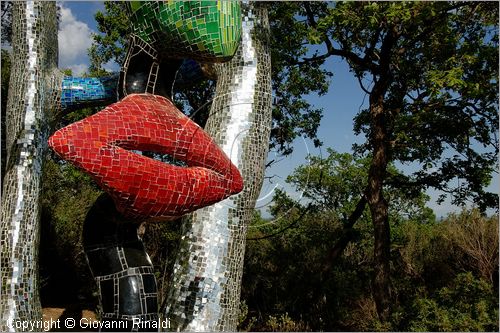 ITALY - Capalbio (GR) - localit Garavicchio - Il Giardino dei Tarocchi - opera originale e fantastica ideata dall'artista francese Niki de Saint Phalle. L'opera rappresenta i 22 Arcani Maggiori dei Tarocchi realizzati con fantastiche sculture di cemento armato e poliestere, ricoperte con mosaico di ceramica , vetri e specchi