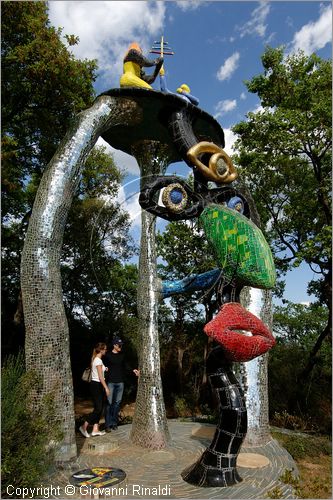 ITALY - Capalbio (GR) - localit Garavicchio - Il Giardino dei Tarocchi - opera originale e fantastica ideata dall'artista francese Niki de Saint Phalle. L'opera rappresenta i 22 Arcani Maggiori dei Tarocchi realizzati con fantastiche sculture di cemento armato e poliestere, ricoperte con mosaico di ceramica , vetri e specchi