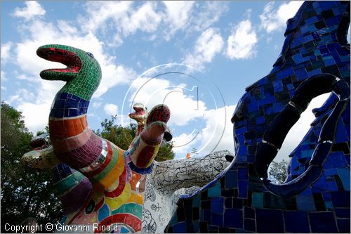 ITALY - Capalbio (GR) - localit Garavicchio - Il Giardino dei Tarocchi - opera originale e fantastica ideata dall'artista francese Niki de Saint Phalle. L'opera rappresenta i 22 Arcani Maggiori dei Tarocchi realizzati con fantastiche sculture di cemento armato e poliestere, ricoperte con mosaico di ceramica , vetri e specchi