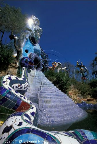 ITALY - CAPALBIO - localit Garavicchio presso Pescia Fiorentina (GR) - "Il Giardino dei Tarocchi" opera originale e fantastica ideata dall'artista francese Niki de Saint Phalle. L'opera rappresenta i 22 Arcani Maggiori dei Tarocchi realizzati con fantastiche sculture di cemento armato e poliestere, ricoperte con mosaico di ceramica , vetri e specchi