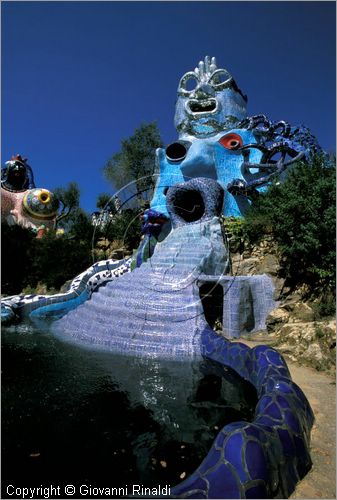 ITALY - CAPALBIO - localit Garavicchio presso Pescia Fiorentina (GR) - "Il Giardino dei Tarocchi" opera originale e fantastica ideata dall'artista francese Niki de Saint Phalle. L'opera rappresenta i 22 Arcani Maggiori dei Tarocchi realizzati con fantastiche sculture di cemento armato e poliestere, ricoperte con mosaico di ceramica , vetri e specchi