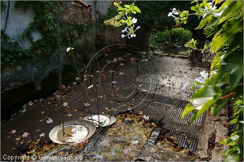 ITALY - MARTA (VT) - Giardino della Cannara - ricavato dai coniugi Mirella e Massimo Faggiani intorno alla loro casa, un'antica peschiera sul fiume Marta forse di origine etrusca. le grate dove rimane il pesce