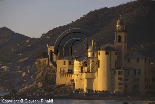 ITALY - LIGURIA - CAMOGLI (GE) - scorcio sulla Basilica di Santa Maria Assunta e del castello al tramonto