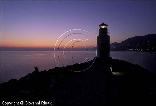 ITALY - LIGURIA - CAMOGLI (GE) - il faro al tramonto sul Golfo Paradiso