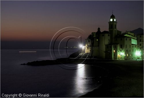 ITALY - LIGURIA - CAMOGLI (GE) - veduta notturna verso la Basilica di Santa Maria Assunta affacciata sul mare del Golfo Paradiso