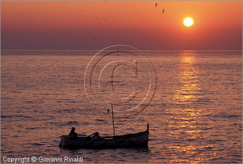 ITALY - LIGURIA - CINQUE TERRE (SP) - pescatore al tramonto