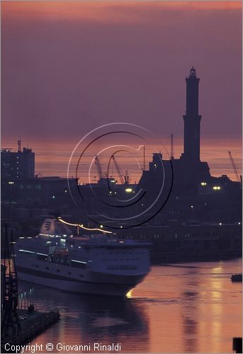 ITALY - LIGURIA - GENOVA - veduta panoramica al tramonto del porto con la tipica lanterna