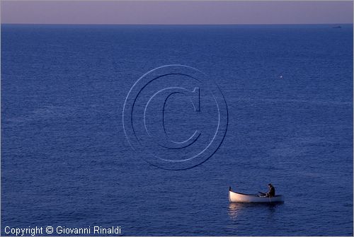 ITALY - LIGURIA - NERVI (GE) - una piccola barca da pesca nel mare di fronte al porto