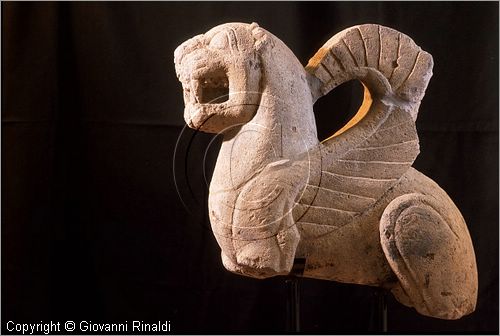 ITALY - ISCHIA DI CASTRO (VT) - Museo Comunale Pietro e Turiddo Lotti - scultura in nenfro rosato a tutto tondo risalenti al VI secolo a.C. dalla necropoli di Castro raffigurante animali fantastici legati alla mitologia - pegaso