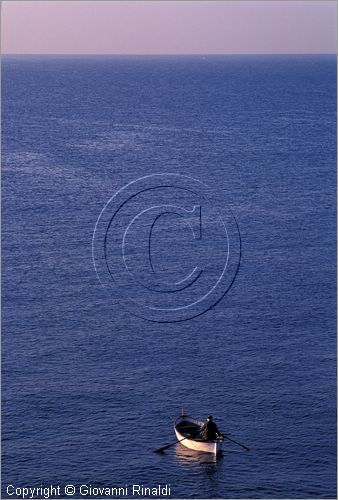 ITALY - NERVI (GE) - una piccola barca da pesca nel mare di fronte al porto