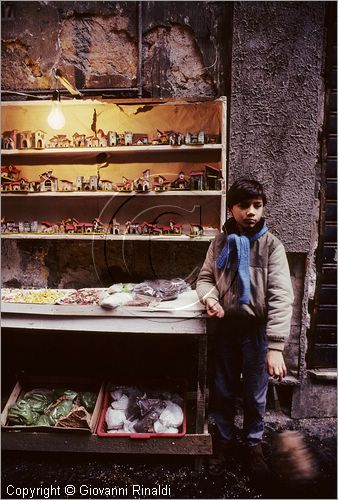 ITALY - NAPOLI - Via di San Gregorio Armeno con gli artigiani che vendono i presepi durante il natale